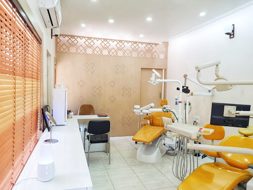 Dr. Ashwini's Smile Zone best dental clinic dentist in mysore root canal dental implant cap crown painless braces